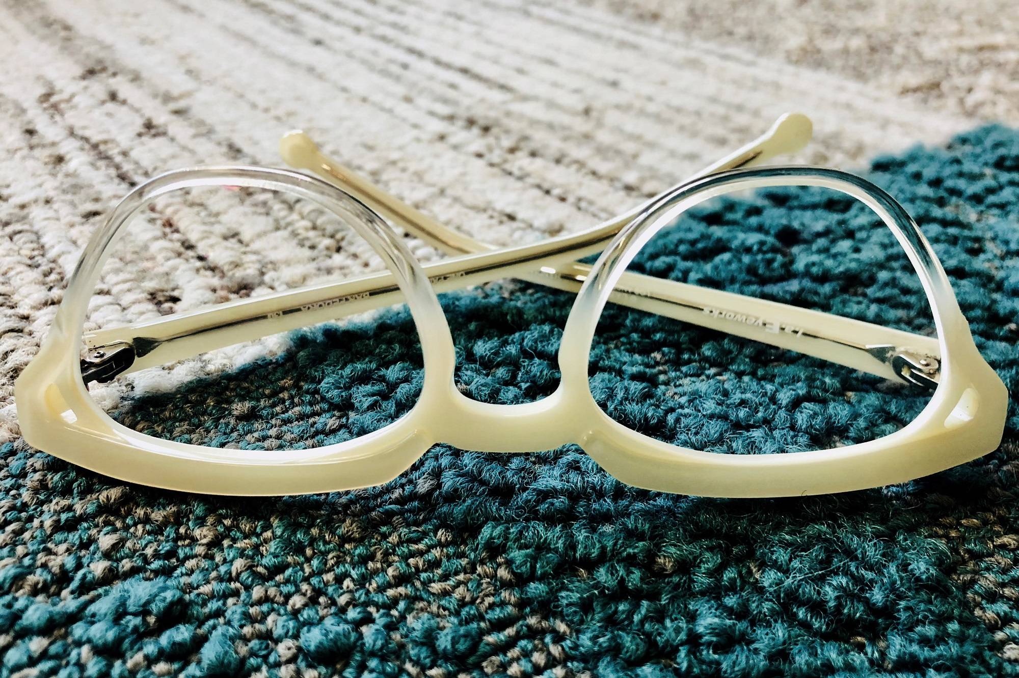 cream colored eyeglass frame